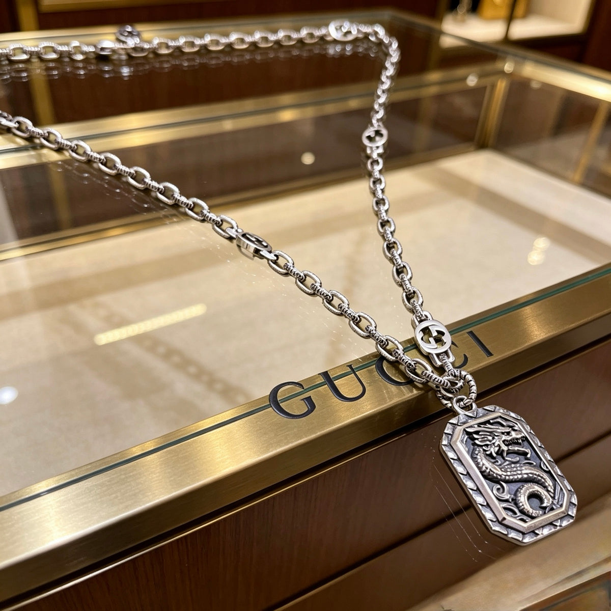 Double-G Emblem Pendant Necklace in Polished Metal-Tone – Design 044 main product view