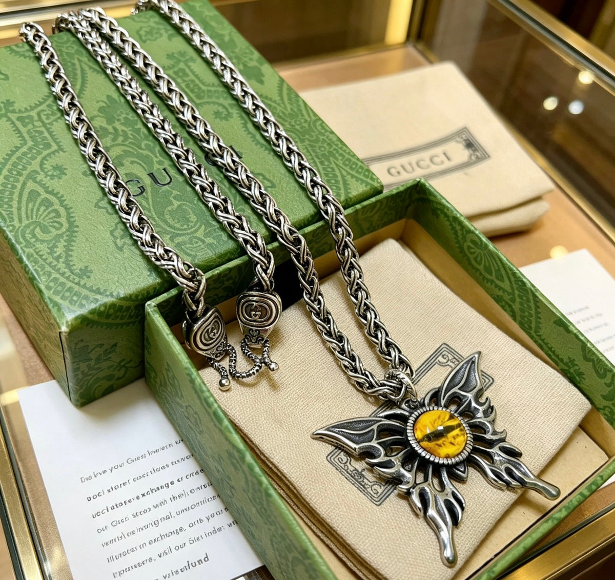 Double-G Emblem Pendant Necklace in Polished Metal-Tone – Design 070 close-up detail