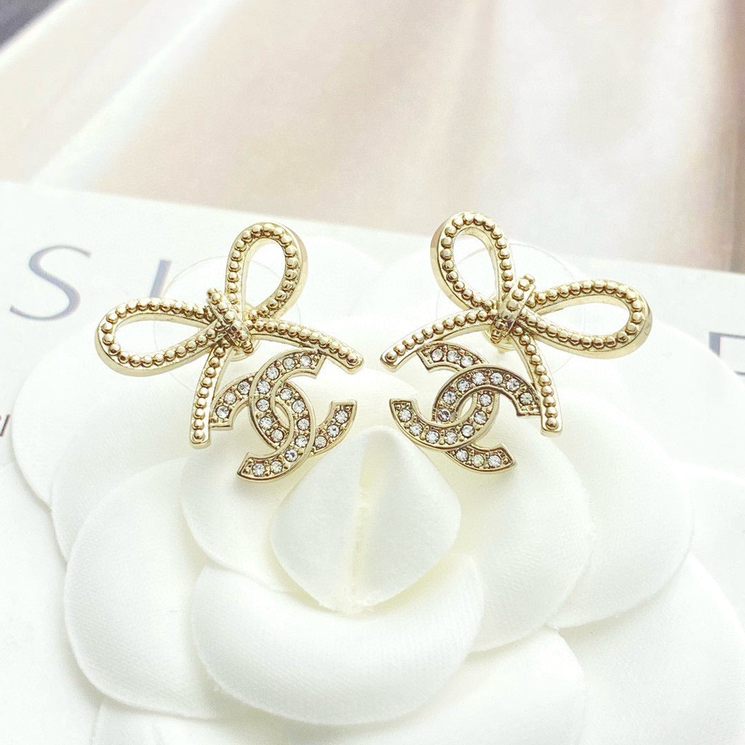 Double-C Emblem Stud Earrings in Polished Metal-Tone – Design 127 side detail