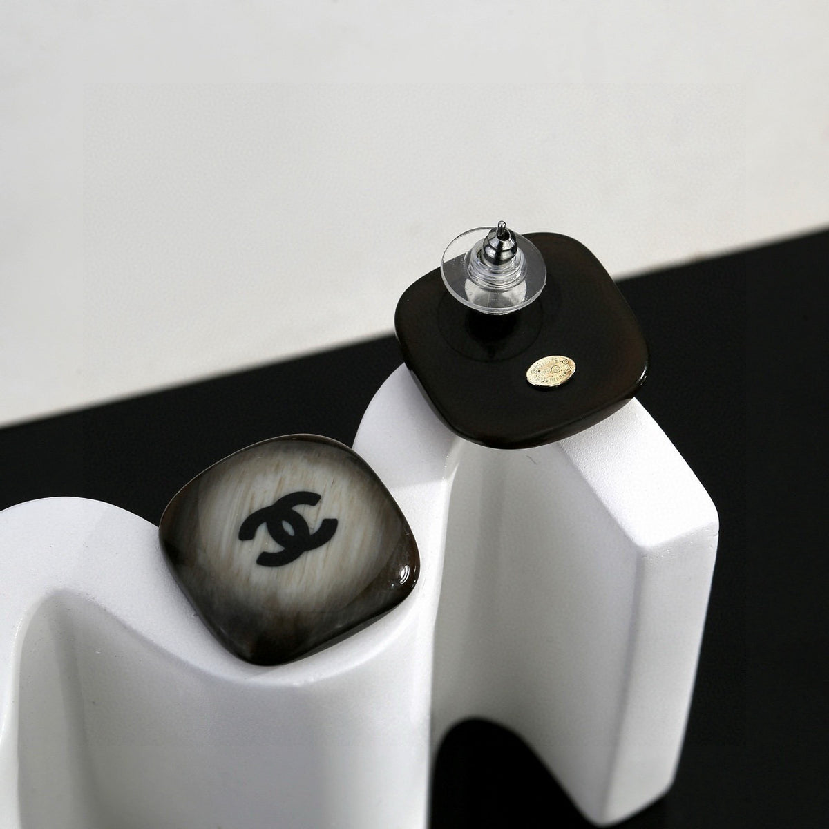 Signature Emblem Stud Earrings in Polished Metal-Tone – Design 014 close-up detail