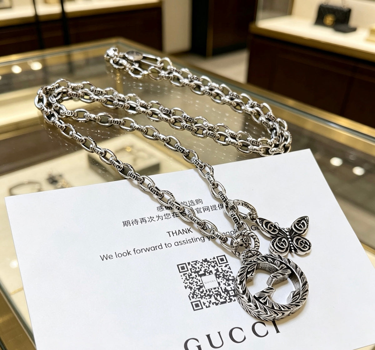Double-G Emblem Pendant Necklace in Polished Metal-Tone – Design 050 detail view