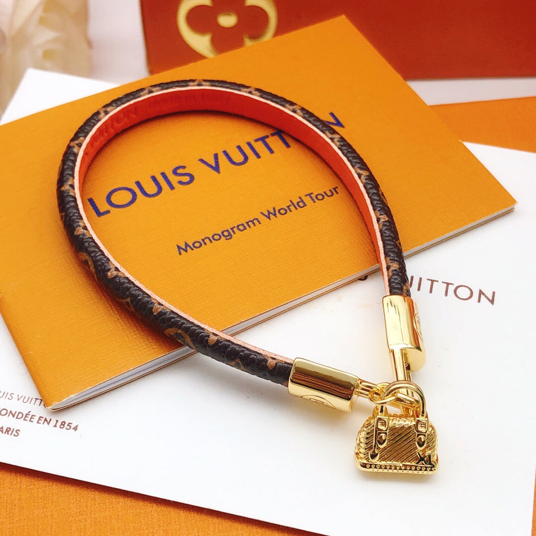 Geometric Emblem Bangle in Gold-Tone – Leather Detail main product view