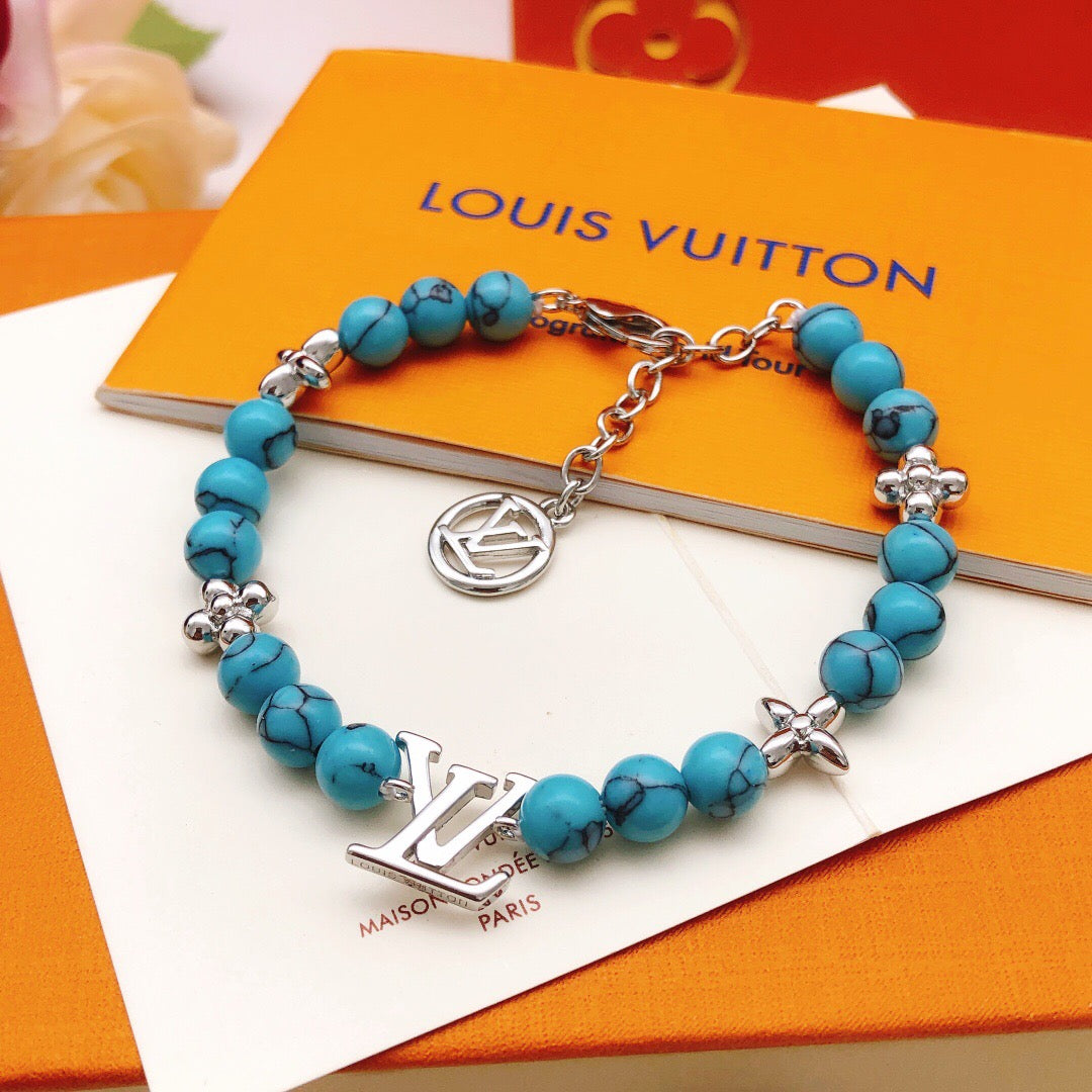 Geometric Emblem Bracelet in Gold-Tone – Blue Detail – Design 004 main product view