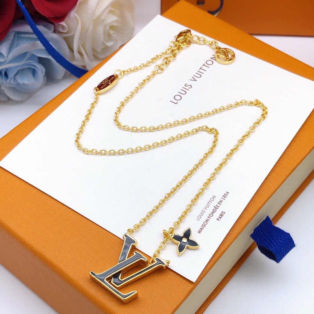 Geometric Emblem Pendant Necklace in Gold-Tone – Black Detail side detail