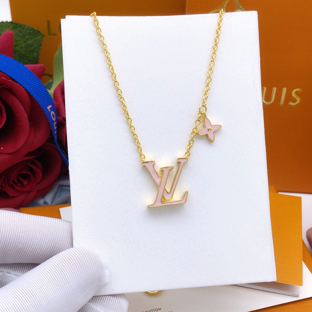 Geometric Emblem Pendant Necklace in Gold-Tone – Pink Detail styled product view