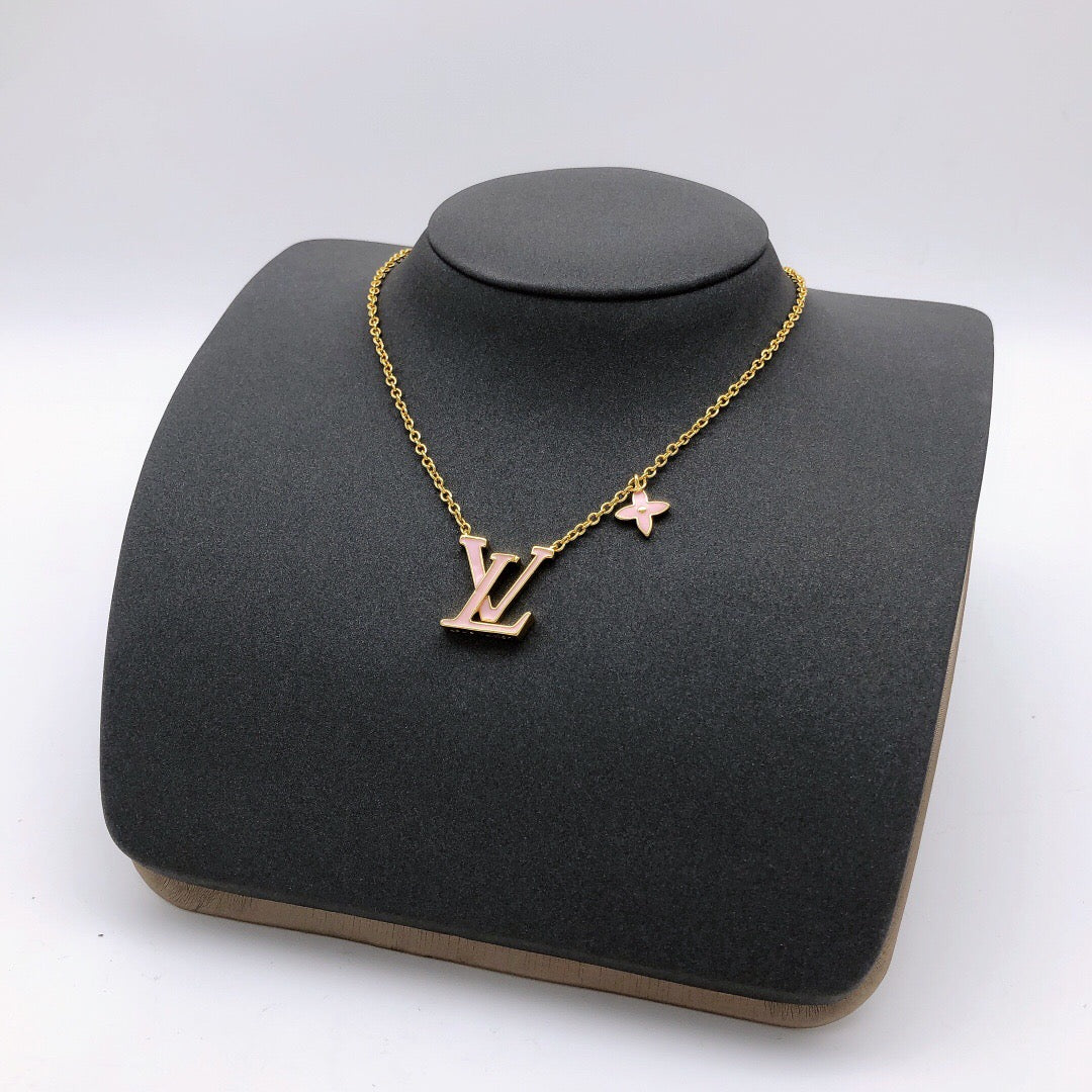 Geometric Emblem Pendant Necklace in Gold-Tone – Pink Detail front product view