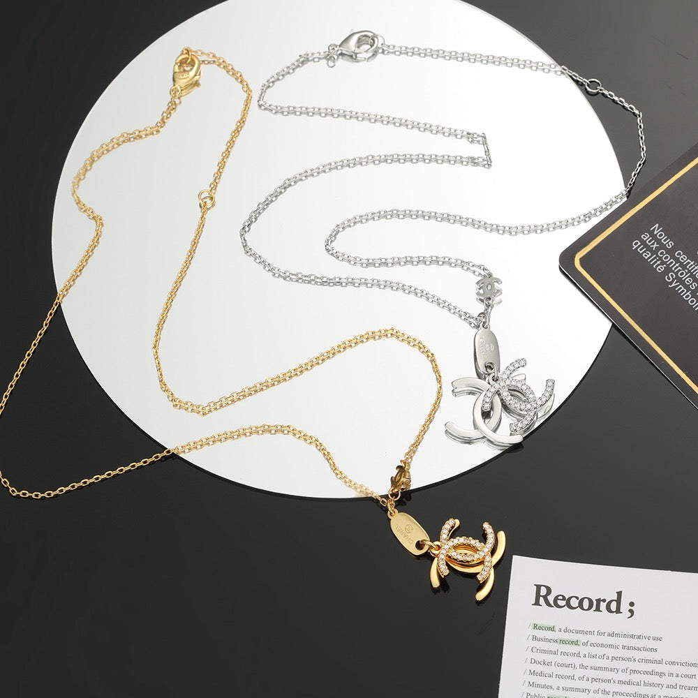 Double-C Emblem Pendant Necklace in Polished Metal-Tone – Design 001 main product view