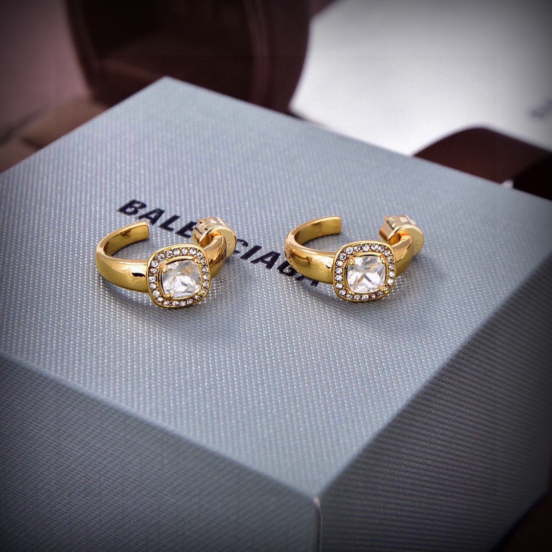 Geometric Emblem Stud Earrings in Gold-Tone – Design 003 close-up detail