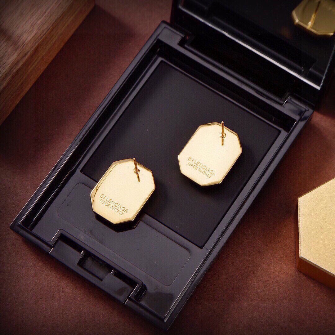 Geometric Emblem Stud Earrings in Gold-Tone – Design 002 close-up detail