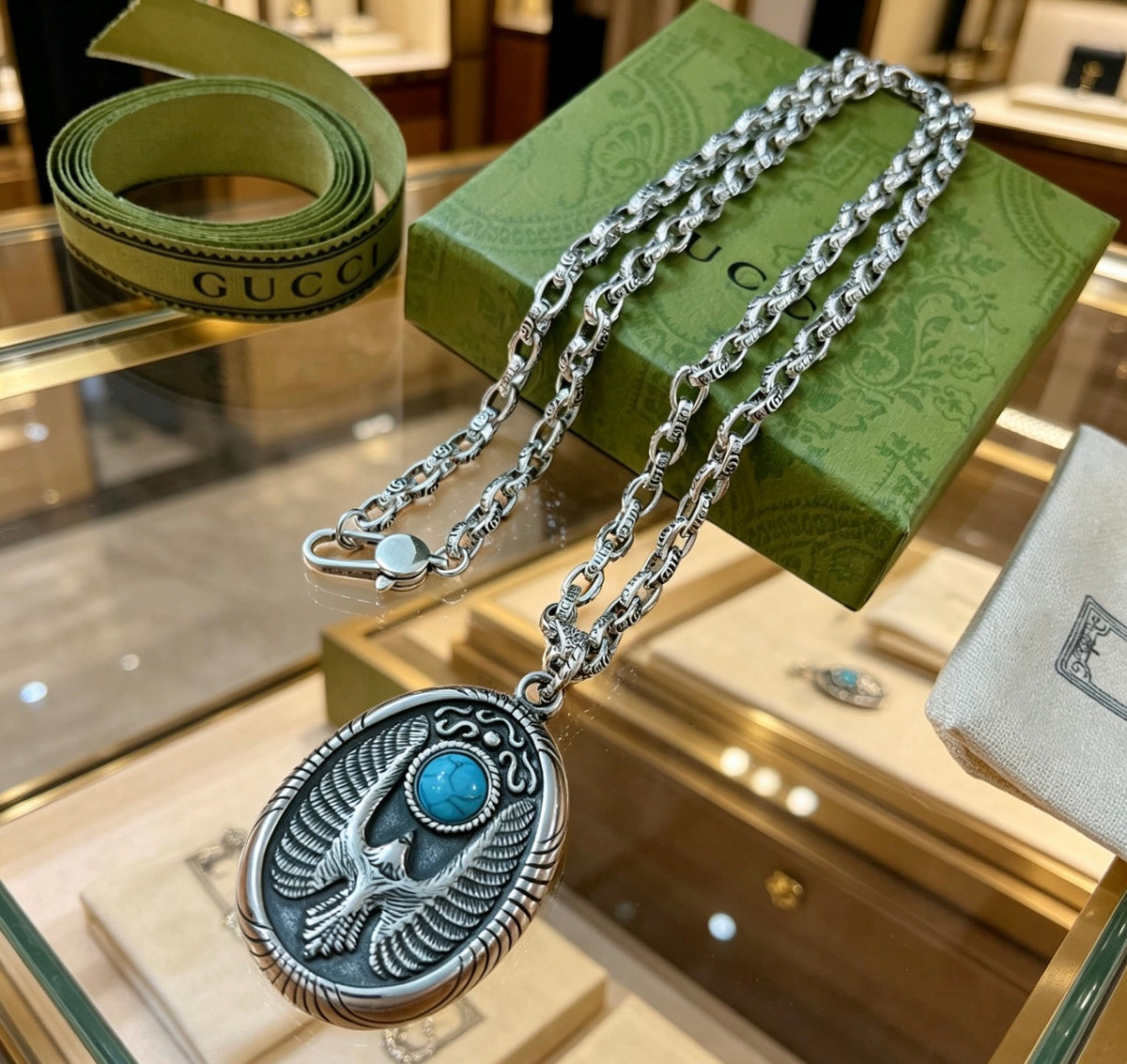 Double-G Emblem Pendant Necklace in Polished Metal-Tone – Vintage Detail – Design 002 close-up detail