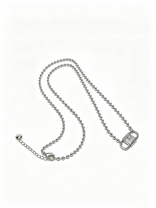 Signature Motif Pendant Necklace in Silver-Tone – Vintage Detail main product view