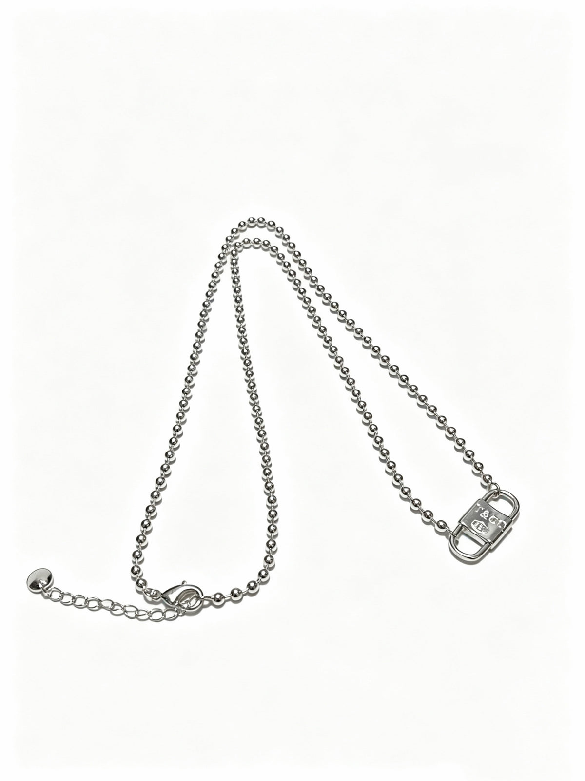 Signature Motif Pendant Necklace in Silver-Tone – Vintage Detail side detail