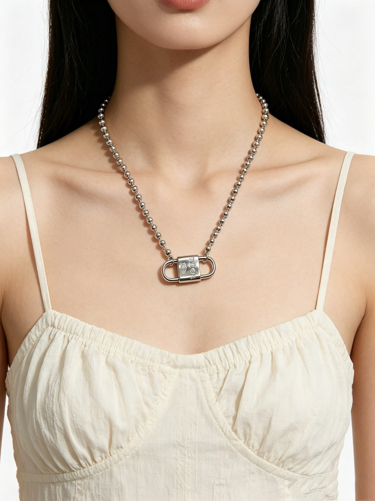 Signature Motif Pendant Necklace in Silver-Tone – Vintage Detail front product view