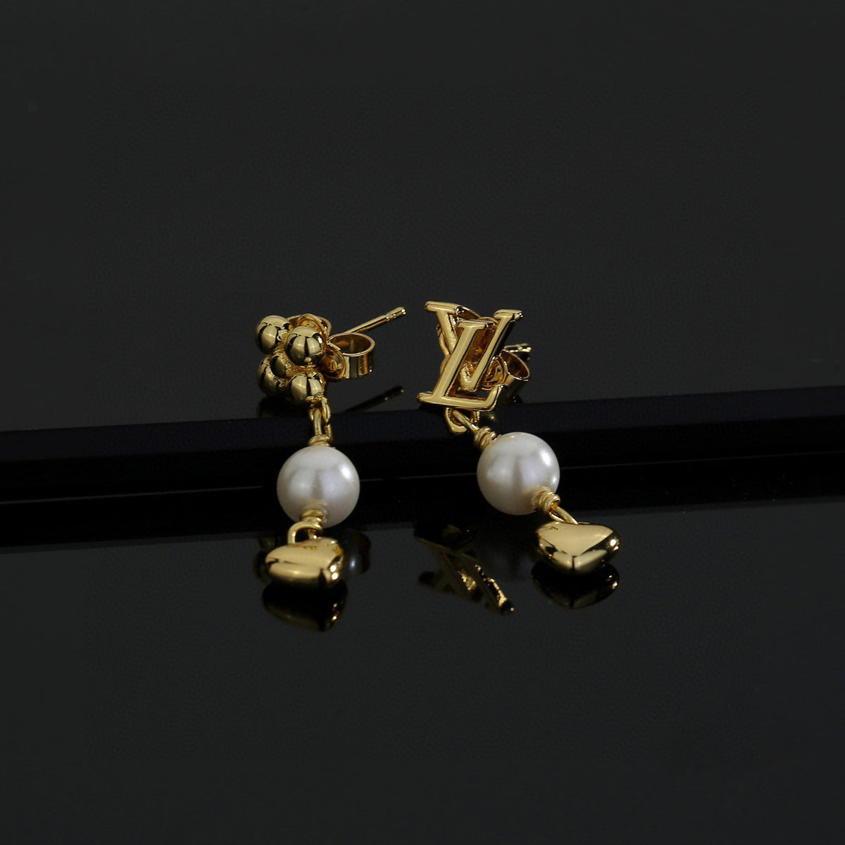Letter Emblem Stud Earrings in Polished Metal-Tone – Design 004 front product view