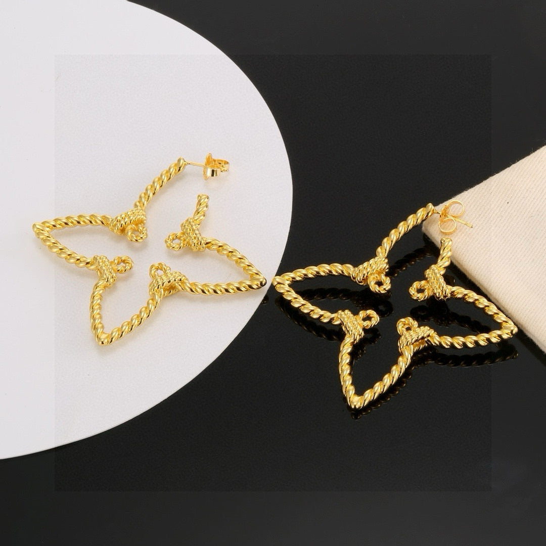 Clover Stud Earrings in Polished Metal-Tone – Clover Detail styled product view