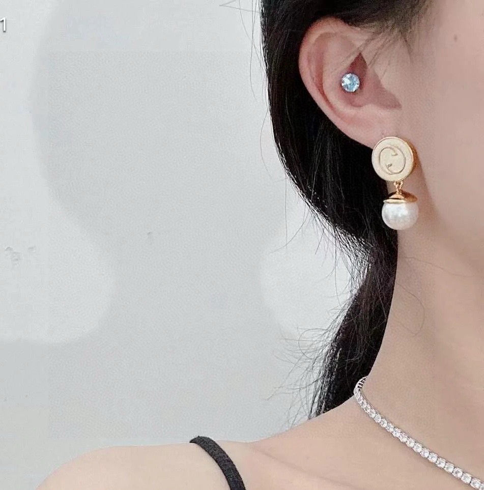 Geometric Emblem Stud Earrings in Polished Metal-Tone – Design 002 detail view