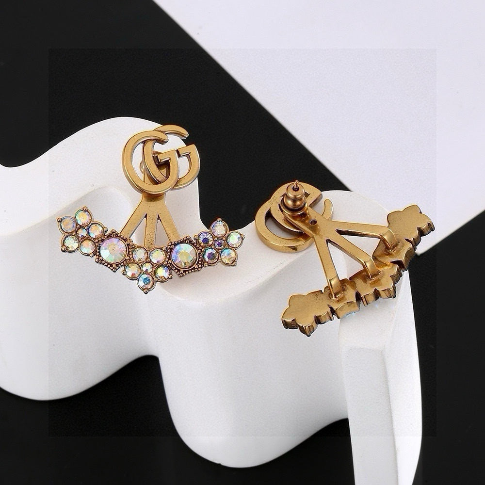 Double-G Emblem Stud Earrings in Gold-Tone – Design 002 close-up detail