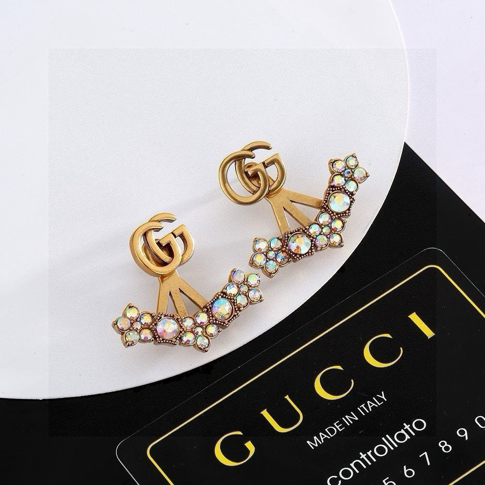 Double-G Emblem Stud Earrings in Gold-Tone – Design 002 detail view