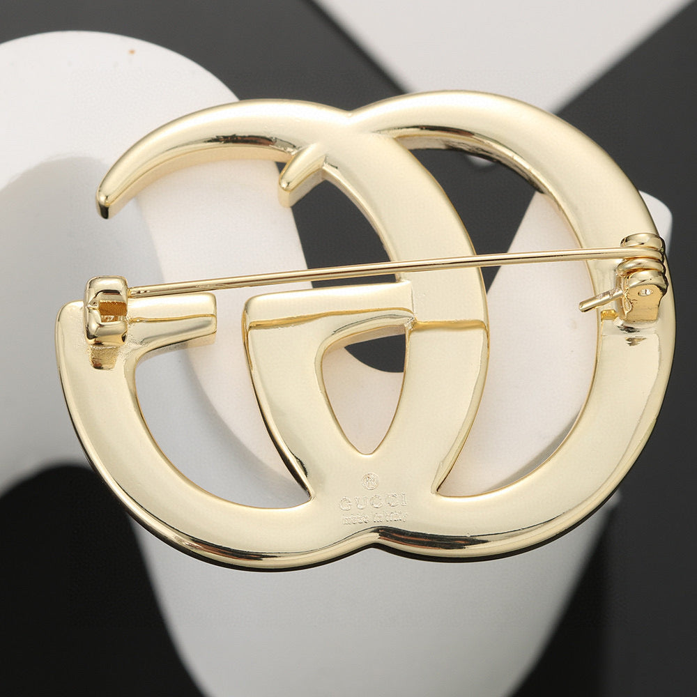 Geometric Emblem Brooch in Polished Metal-Tone – Vintage Detail front product view