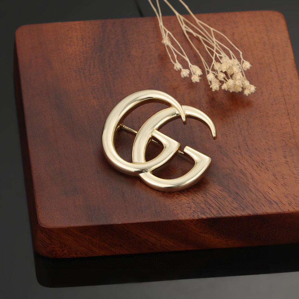 Geometric Emblem Brooch in Polished Metal-Tone – Vintage Detail detail view