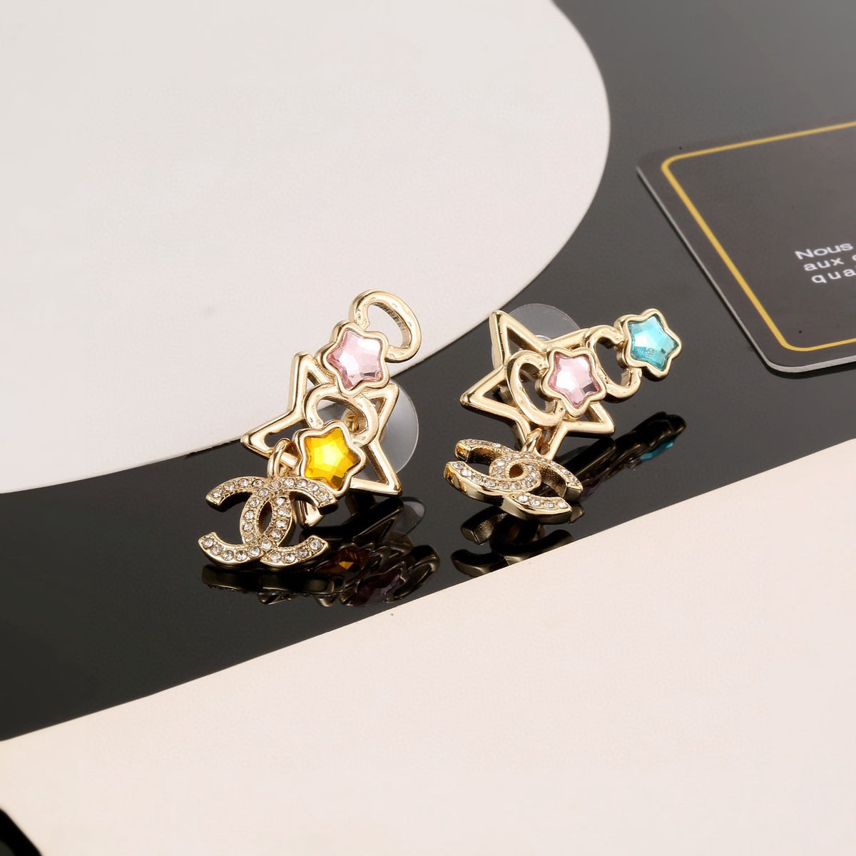 Double-C Emblem Stud Earrings in Gold-Tone – Star Detail front product view