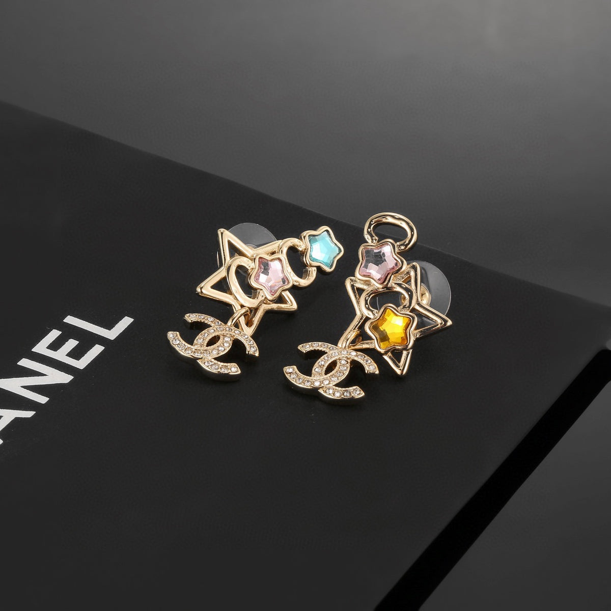 Double-C Emblem Stud Earrings in Gold-Tone – Star Detail styled product view