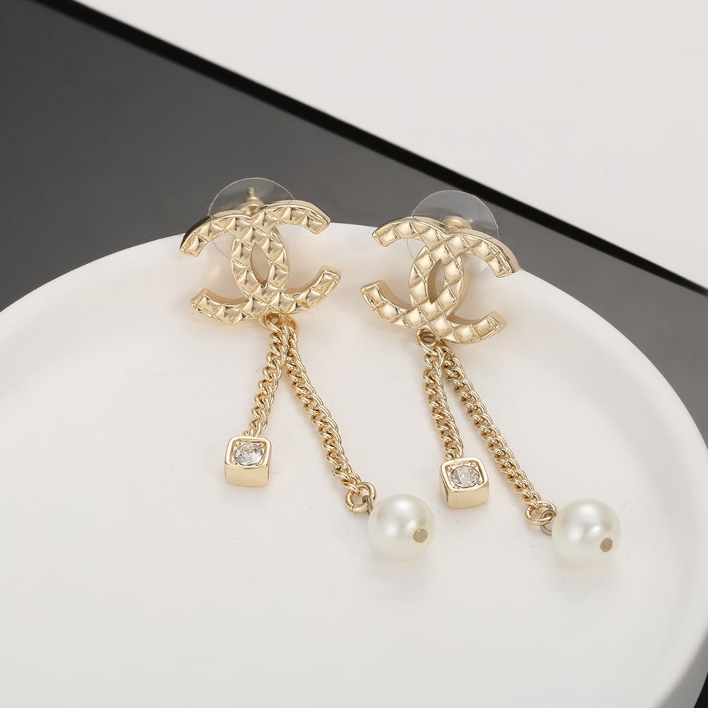 Signature Emblem Stud Earrings in Silver-Tone – Design 001 close-up detail