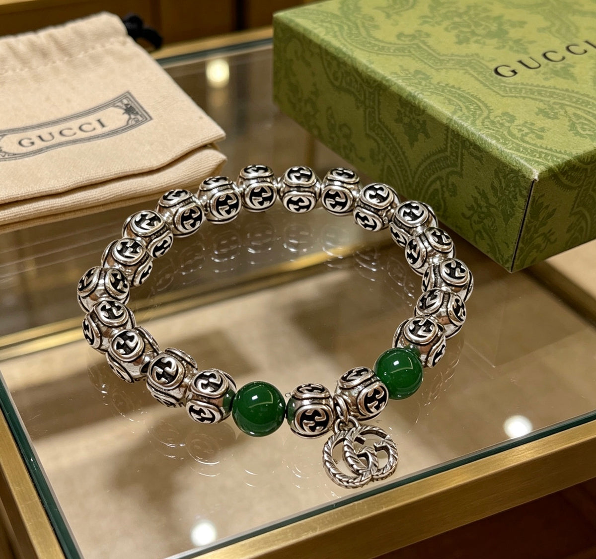 Double-G Emblem Beaded Bracelet in Polished Metal-Tone – Crystal Detail front product view
