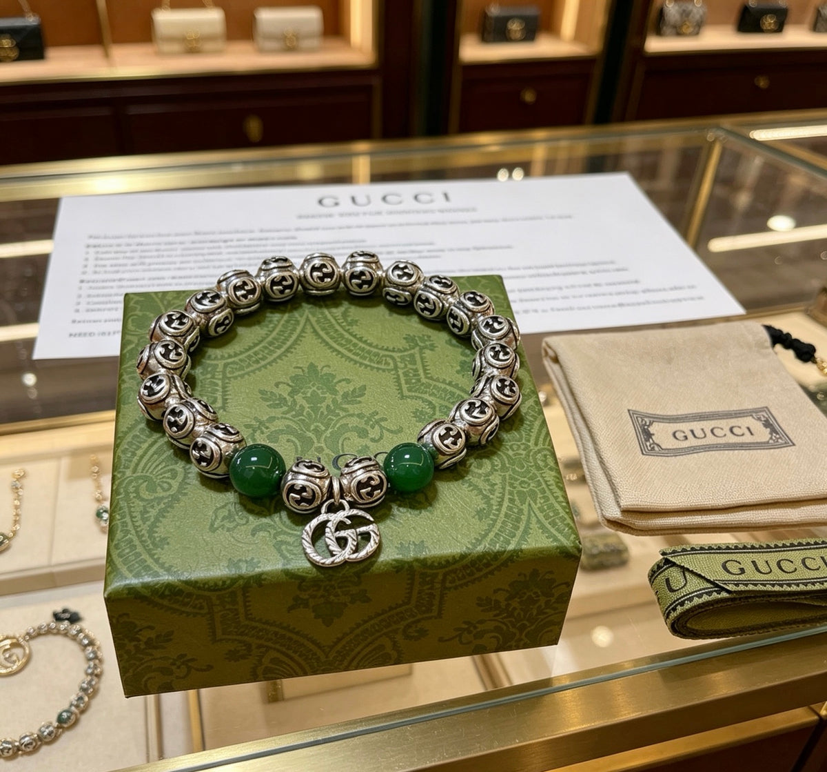 Double-G Emblem Beaded Bracelet in Polished Metal-Tone – Crystal Detail front product view