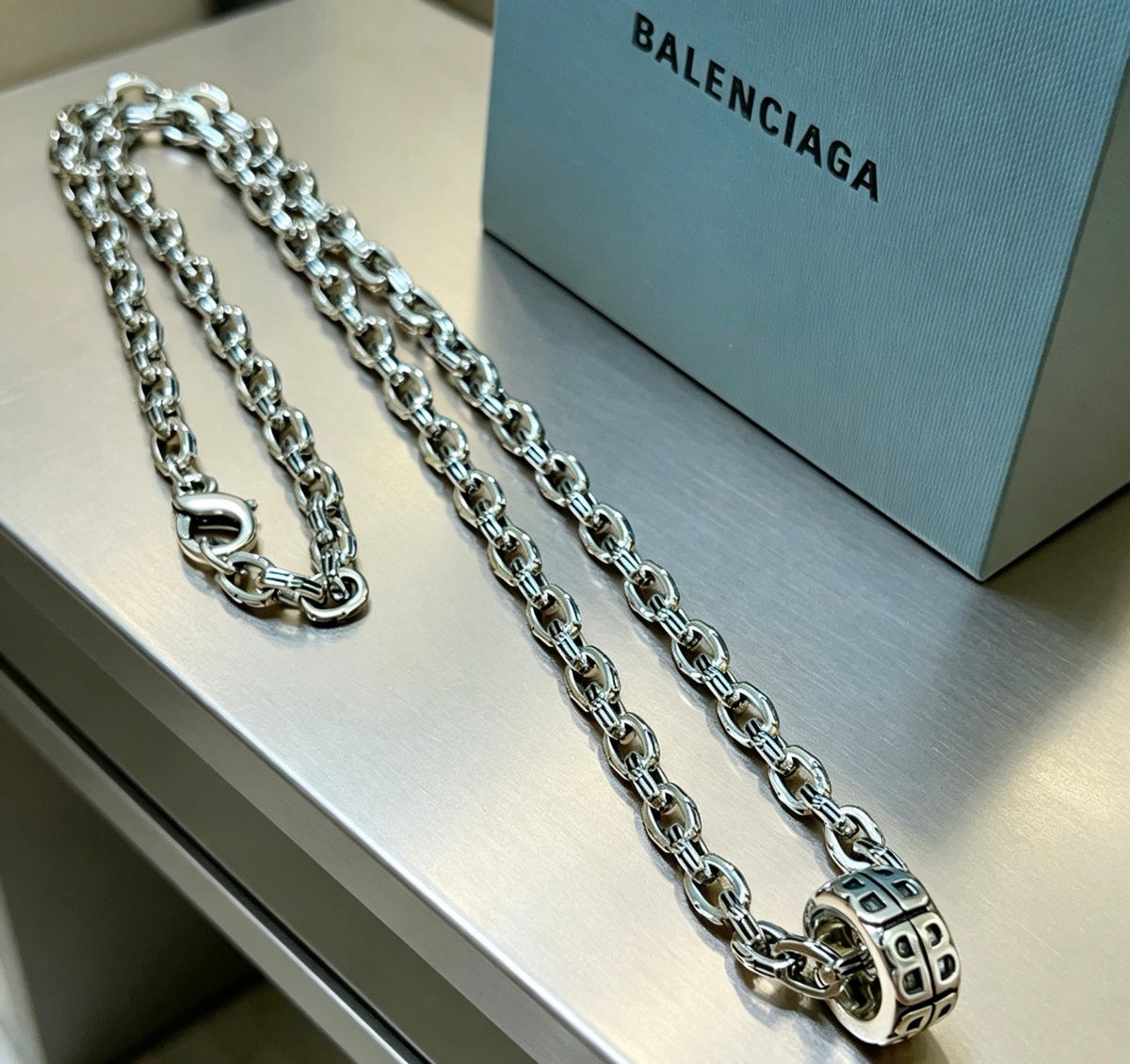 Geometric Emblem Pendant Necklace in Polished Metal-Tone – Vintage Detail front product view