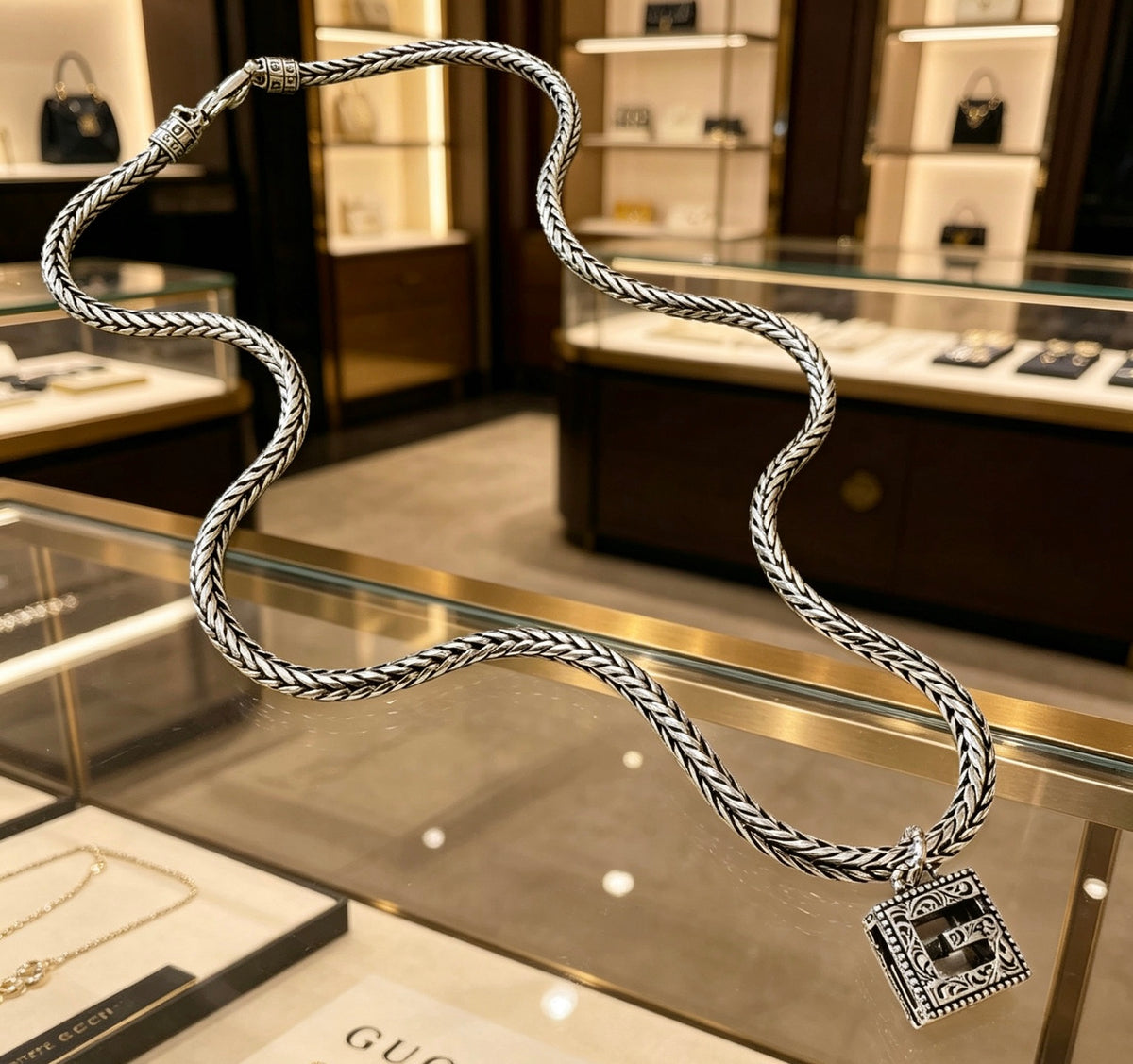 Double-G Emblem Pendant Necklace in Gold-Tone – Design 001 close-up detail