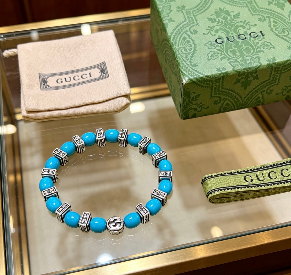 Double-G Emblem Beaded Bracelet in Polished Metal-Tone – Turquoise Detail detail view