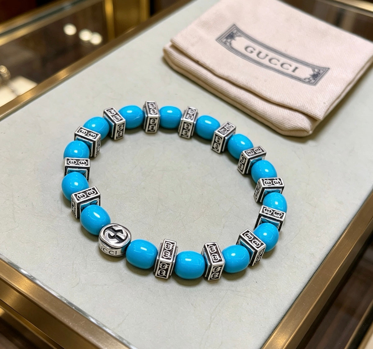 Double-G Emblem Beaded Bracelet in Polished Metal-Tone – Turquoise Detail front product view