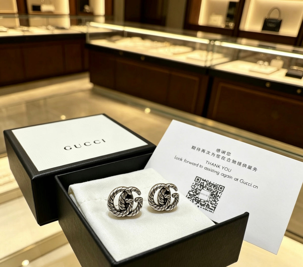 Double-G Emblem Stud Earrings in Polished Metal-Tone – Vintage Detail front product view