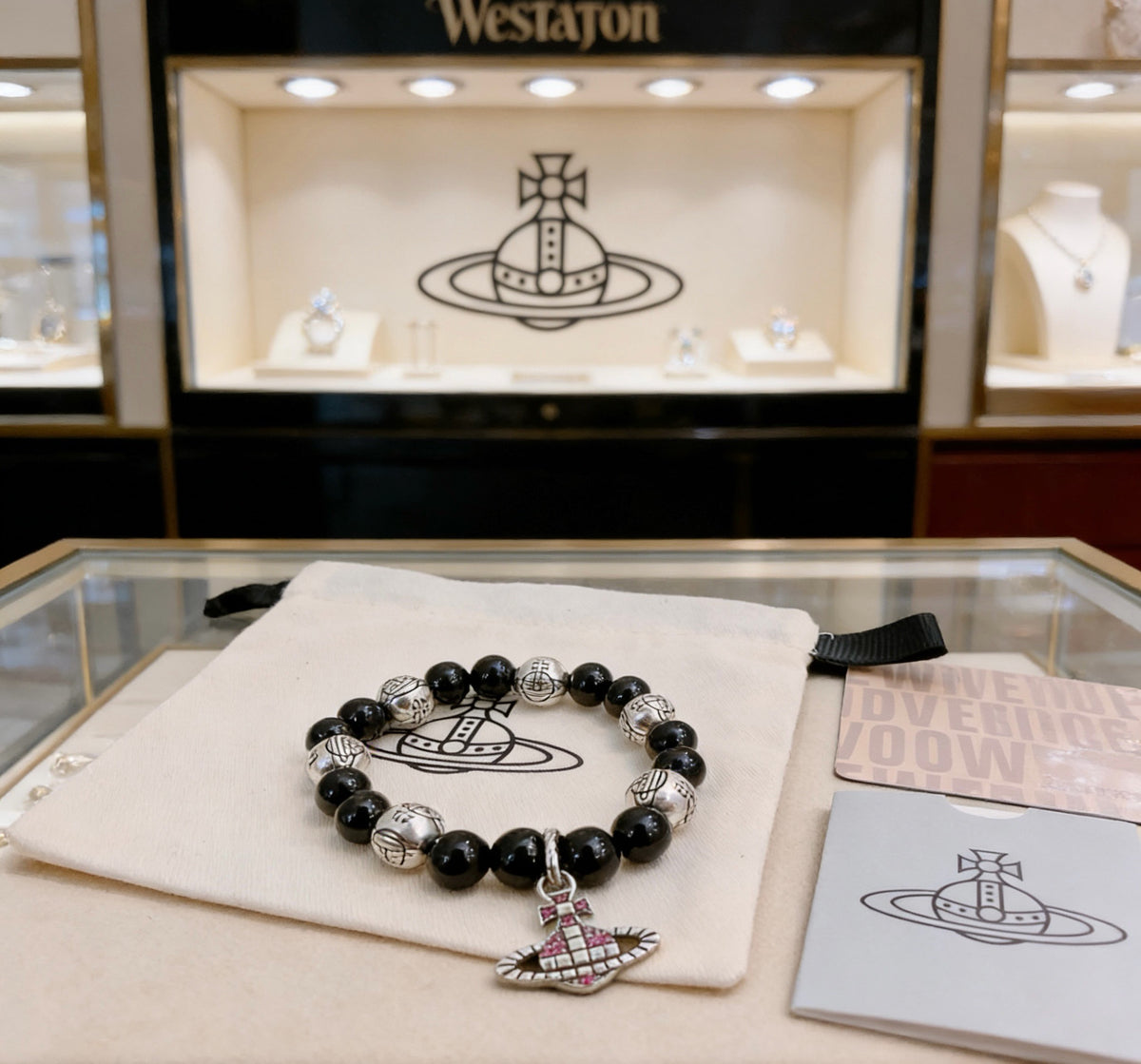 Orb-Inspired Emblem Bracelet in Silver-Tone – Vintage Detail side detail