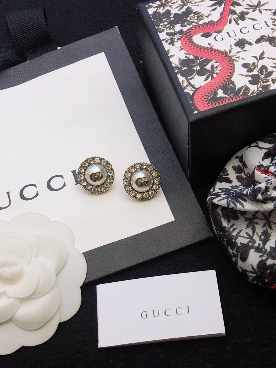 Letter Emblem Stud Earrings in Polished Metal-Tone main product view