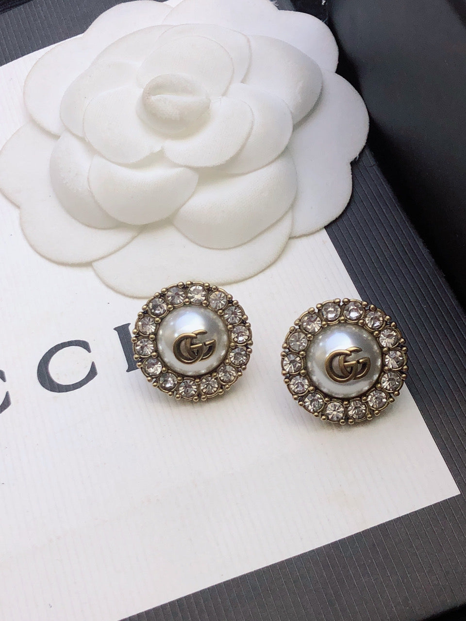 Letter Emblem Stud Earrings in Polished Metal-Tone front product view