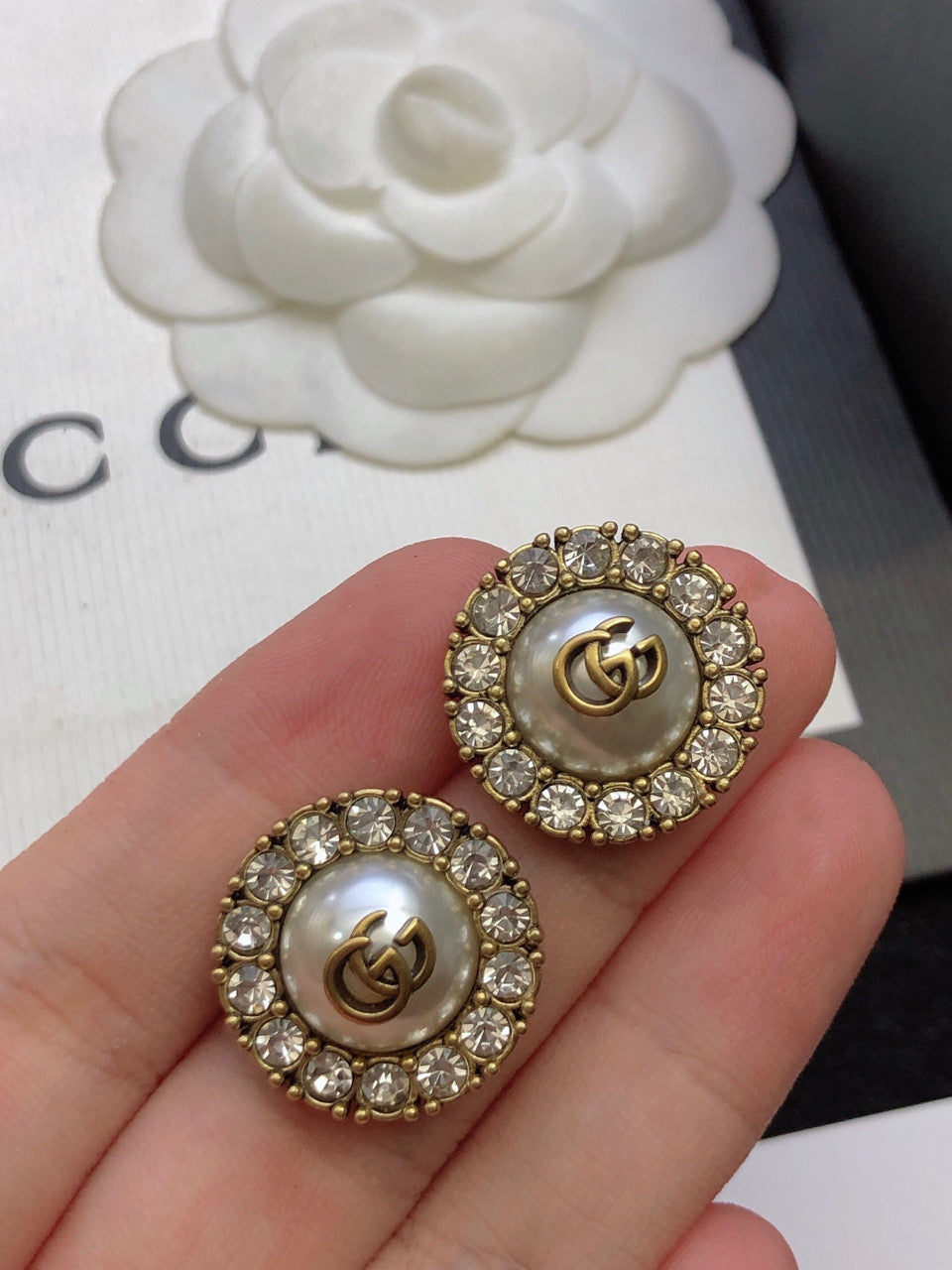 Letter Emblem Stud Earrings in Polished Metal-Tone styled product view