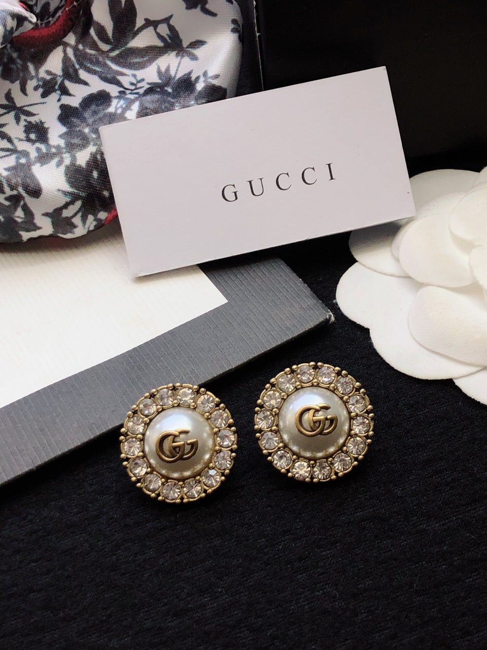 Letter Emblem Stud Earrings in Polished Metal-Tone main product view
