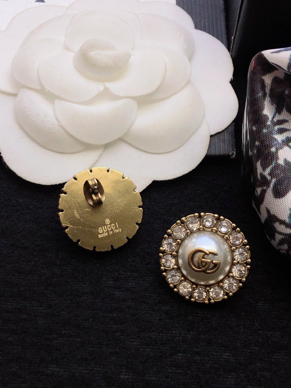 Letter Emblem Stud Earrings in Polished Metal-Tone detail view