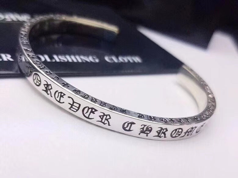 Signature Emblem Bangle in Polished Metal-Tone – Design 015 close-up detail